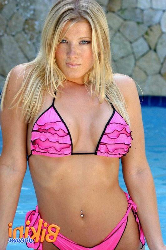15P Blonde babe in a thong bikini at the pool