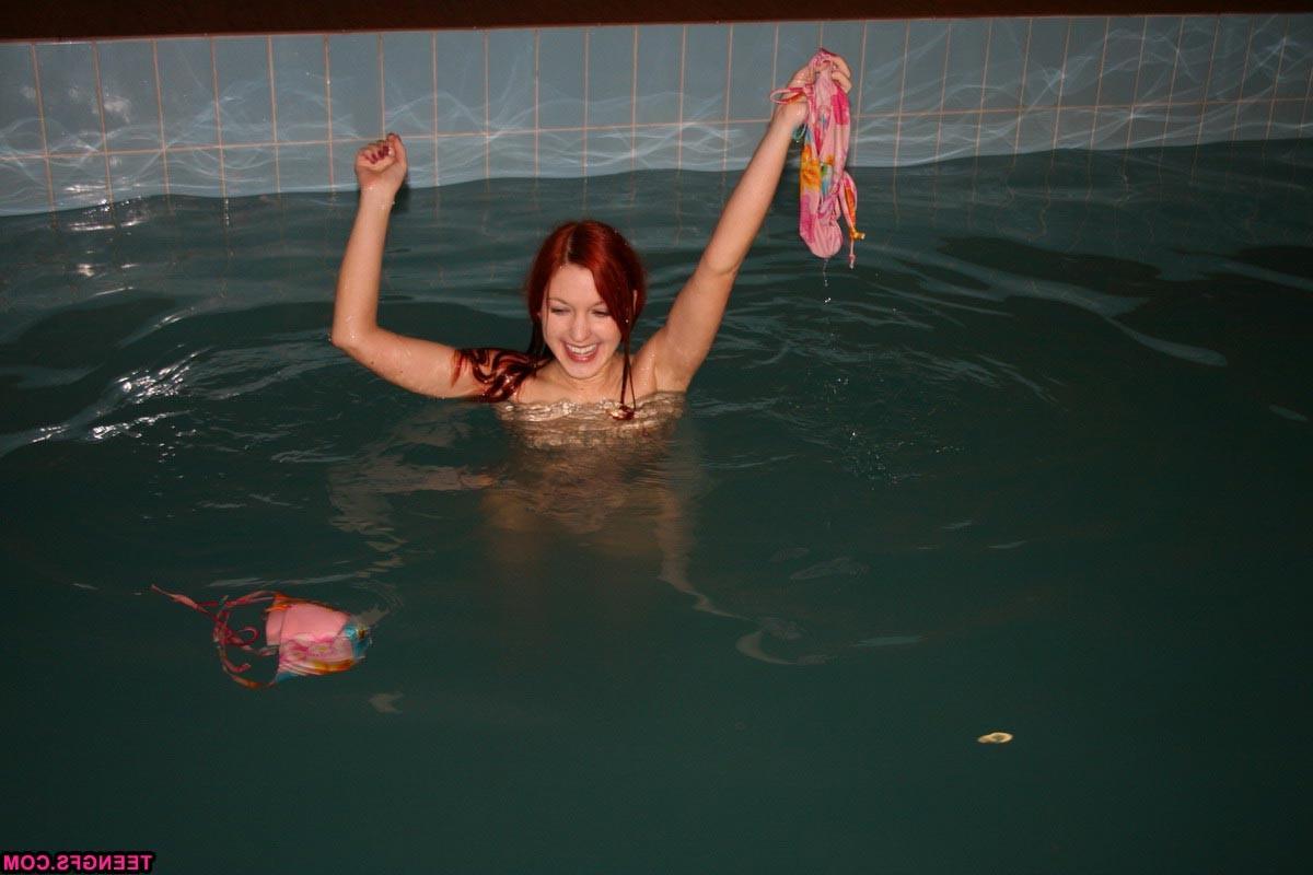 16P Bikini teen strips down in the pool and shows pink