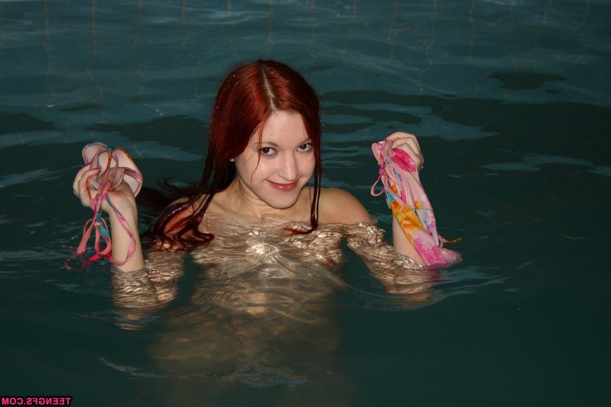 16P Bikini teen strips down in the pool and shows pink