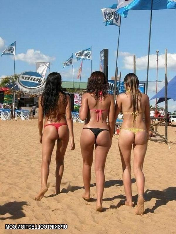 15P Girls have fun on the beach ripping off each other's thong