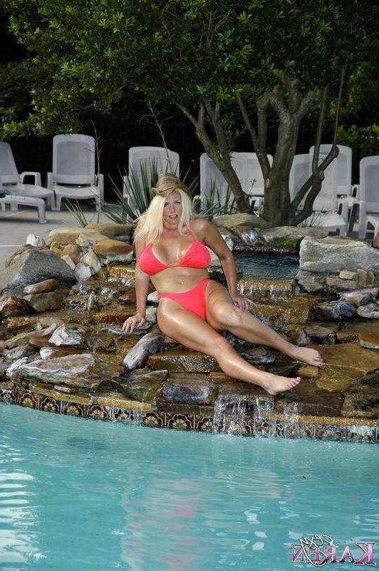 16P Busty Karen Fisher Strips Bikini