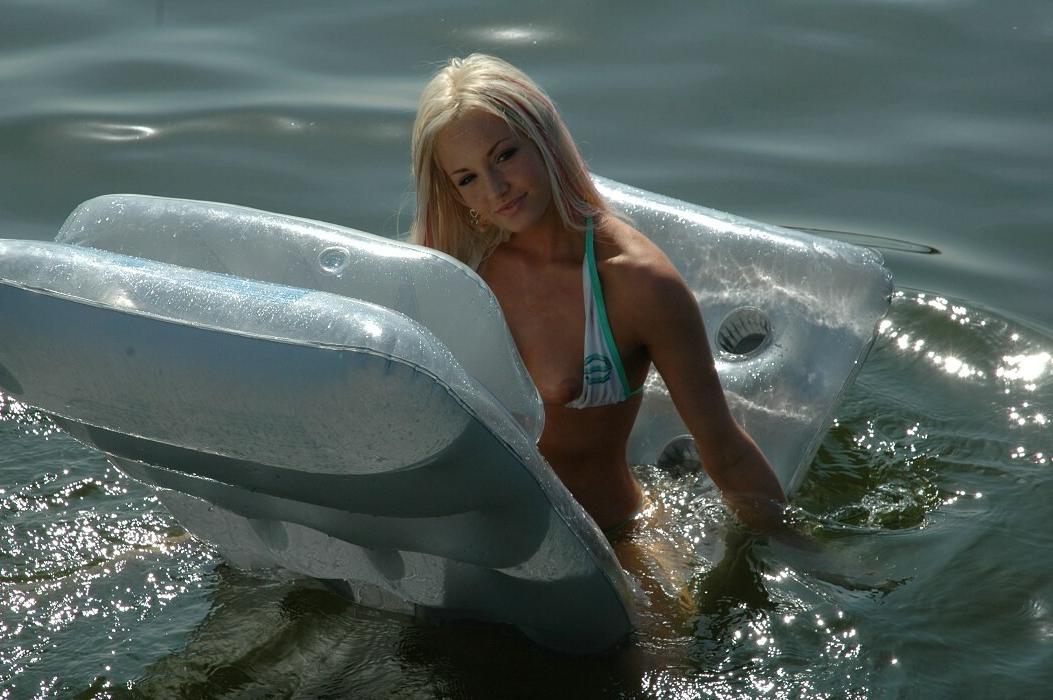 15P Cute bikini blonde teen playing in the lake on a hot summer day