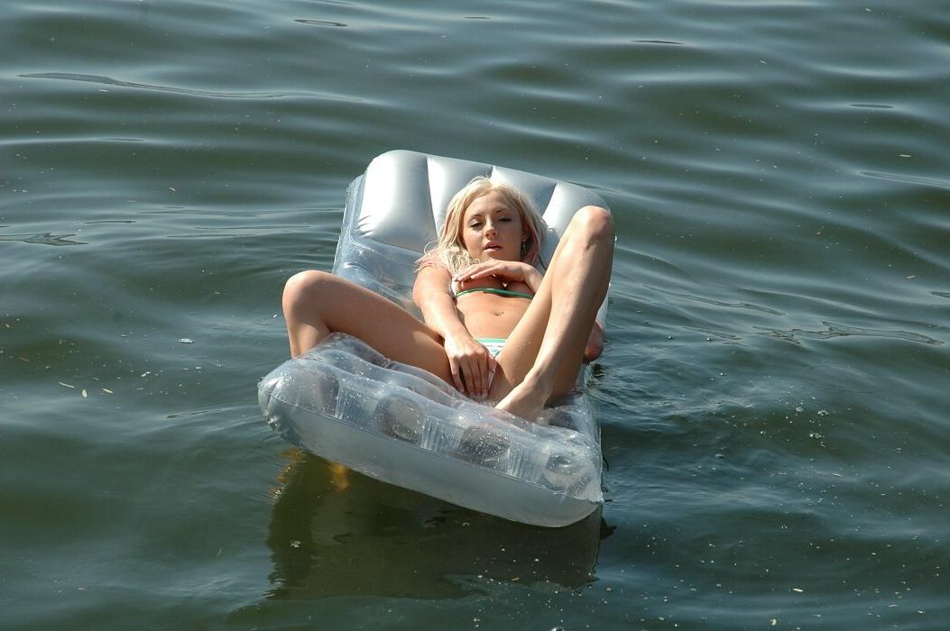 15P Cute bikini blonde teen playing in the lake on a hot summer day