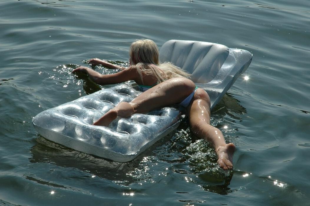 15P Cute bikini blonde teen playing in the lake on a hot summer day