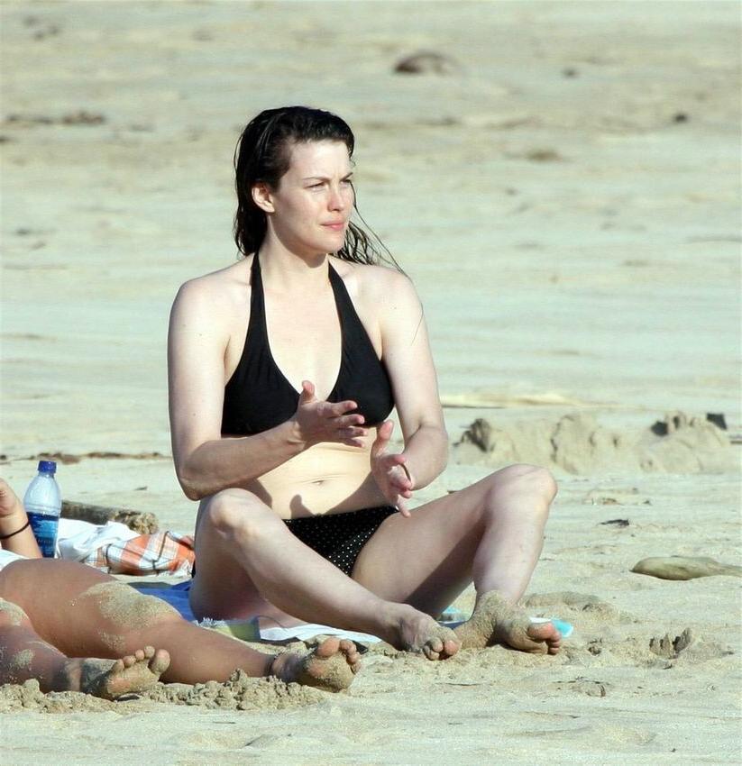 18P Actress Liv Tylers perfect small tits and looking hot in bikini