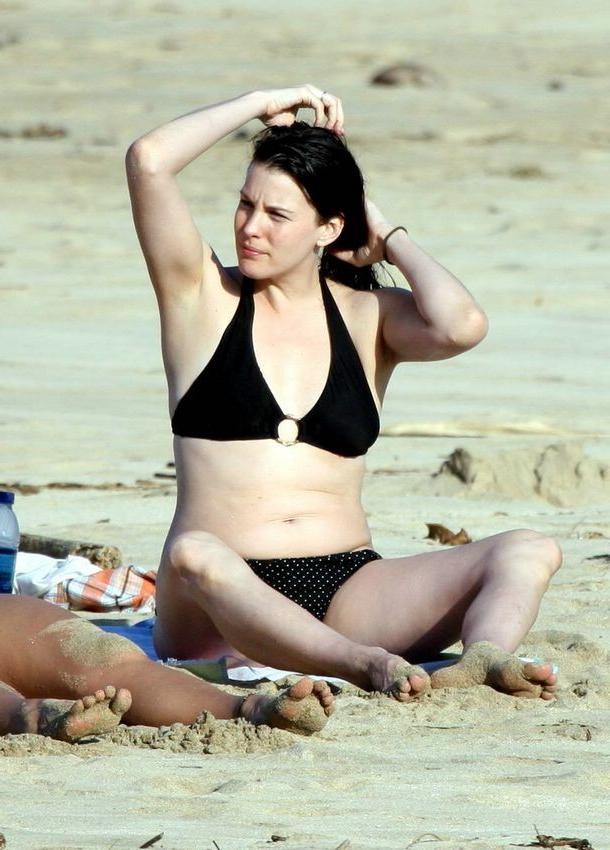 18P Actress Liv Tylers perfect small tits and looking hot in bikini