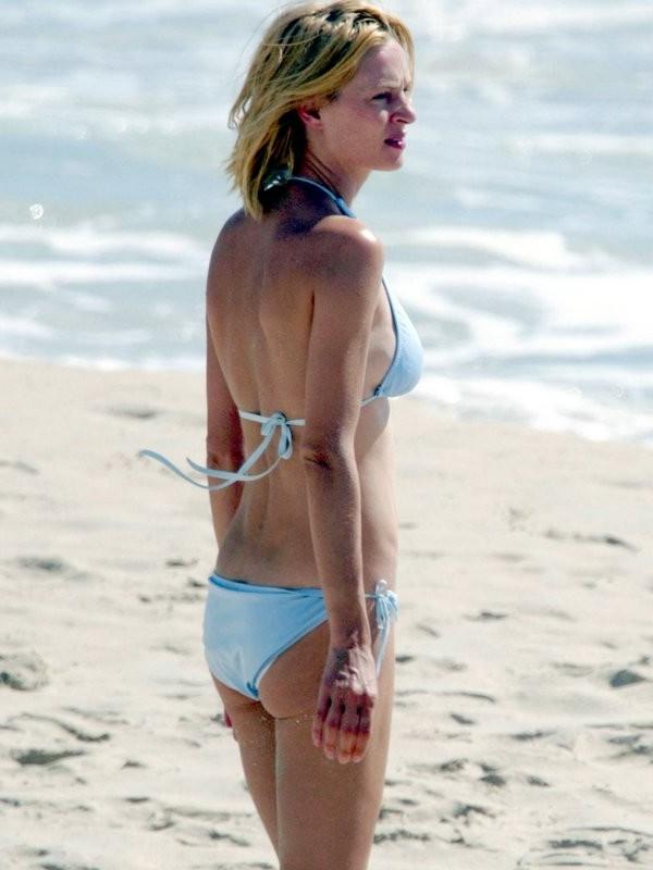 15P Tall blonde celeb Uma Thurman in sexy bikini