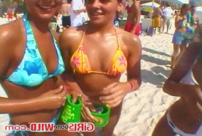 15P Wild young bikini babes show off their firm asses and tits
