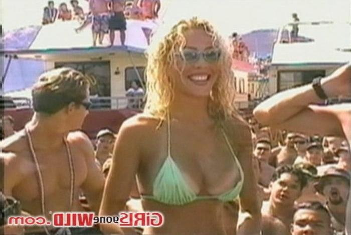 10P Busty bikini slut shows us her huge titties