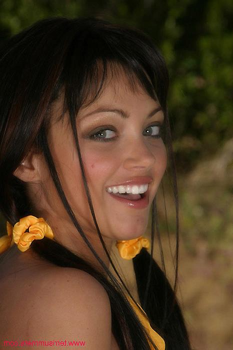 16P Teasing brunette strips off her yellow bikini