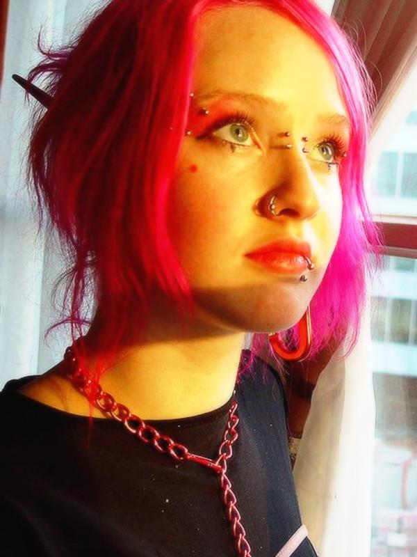 16P Pink haired goth babe Masscha shows her large pierced nipples