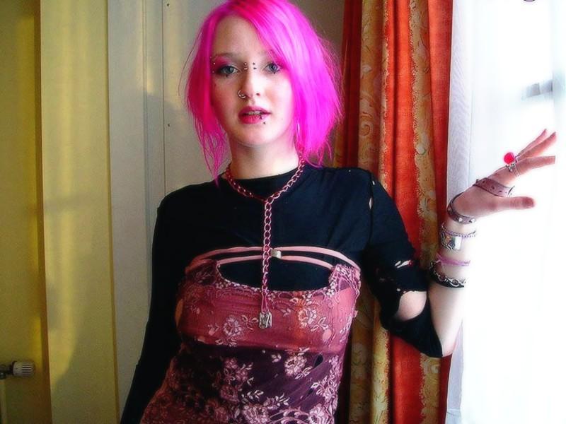 16P Pink haired goth babe Masscha shows her large pierced nipples