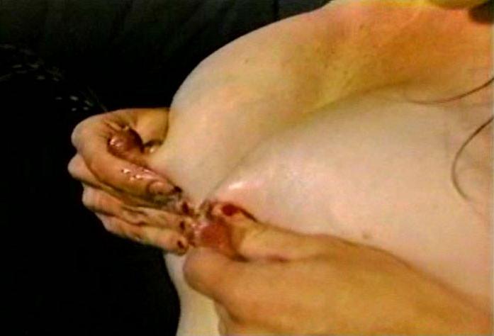 16P Older woman squirts milk from her tits