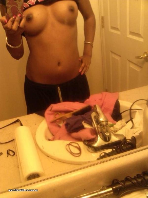 14P Pretty black GF showing her tits in hot mirror shots