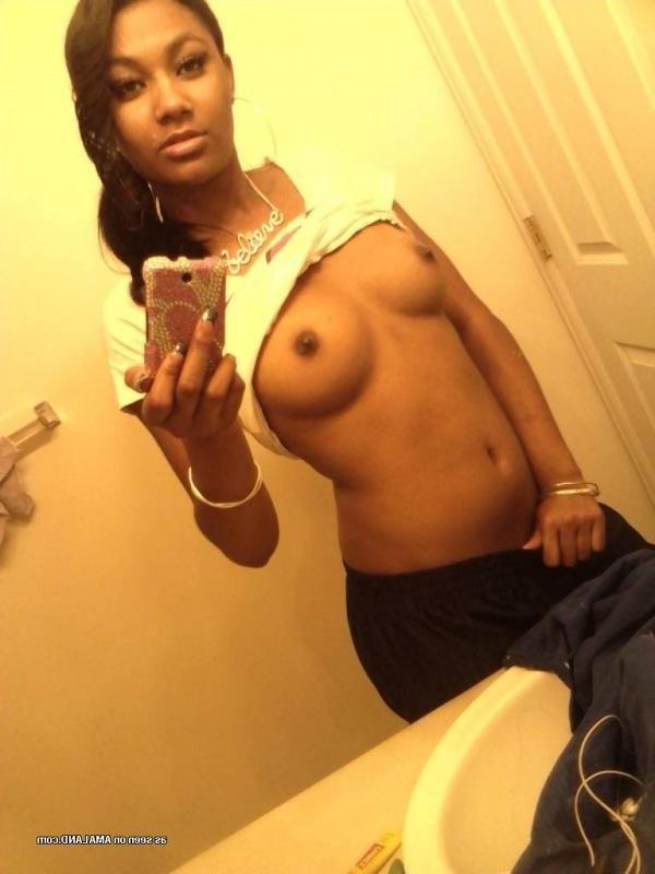 14P Pretty black GF showing her tits in hot mirror shots