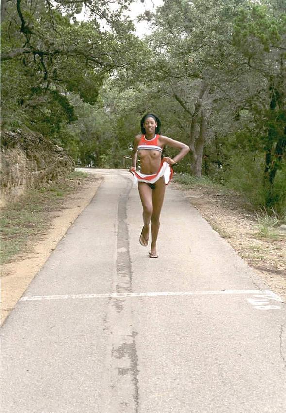 15P Hot ebony cheerleader naked in park