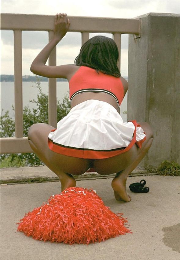 15P Hot ebony cheerleader naked in park