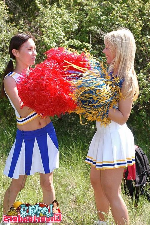 15P Two heady cheerleaders licking and toying their snatches outdoors