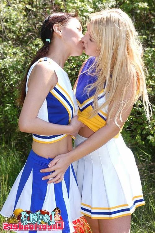 15P Two heady cheerleaders licking and toying their snatches outdoors