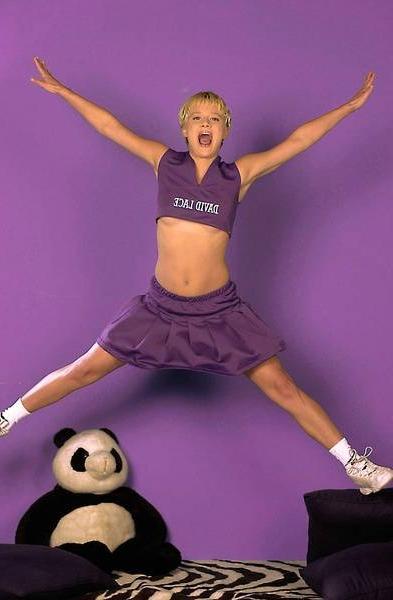 15P Short haired cheerleader Pamela shows her small boobies