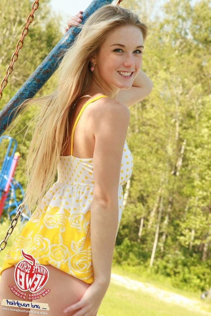 15P Tiny titted blonde teenie slowly strips outdoors