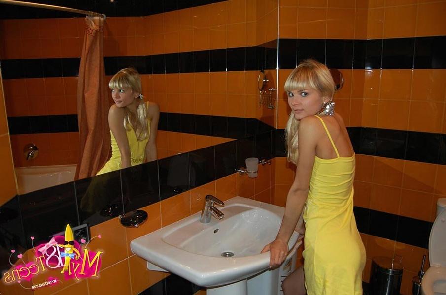 17P Exciting blonde teen showing her petite shaved twat in bathroom