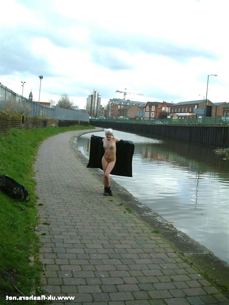 15P Long haired amateur blonde chick is nude in public places