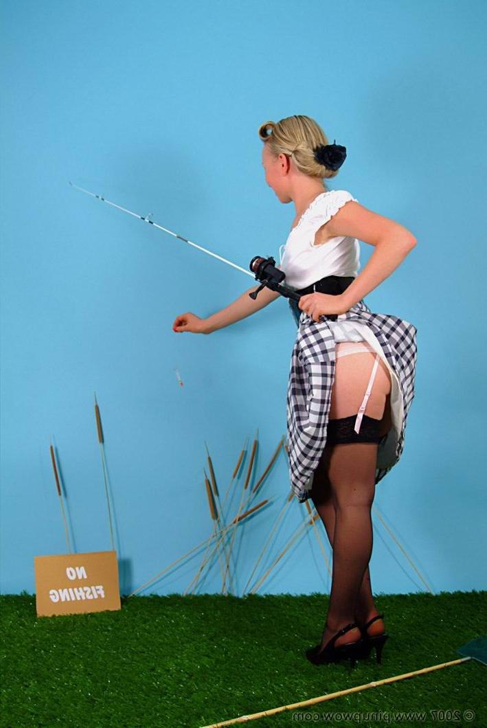 15P Blonde in stockings poses while fishing