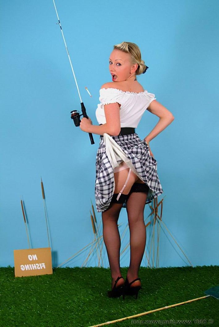 15P Blonde in stockings poses while fishing