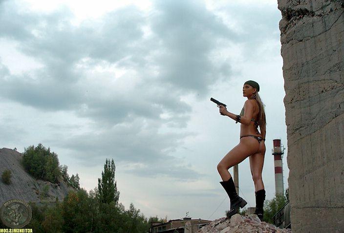 15P Sexy babe in a military thong got a gun