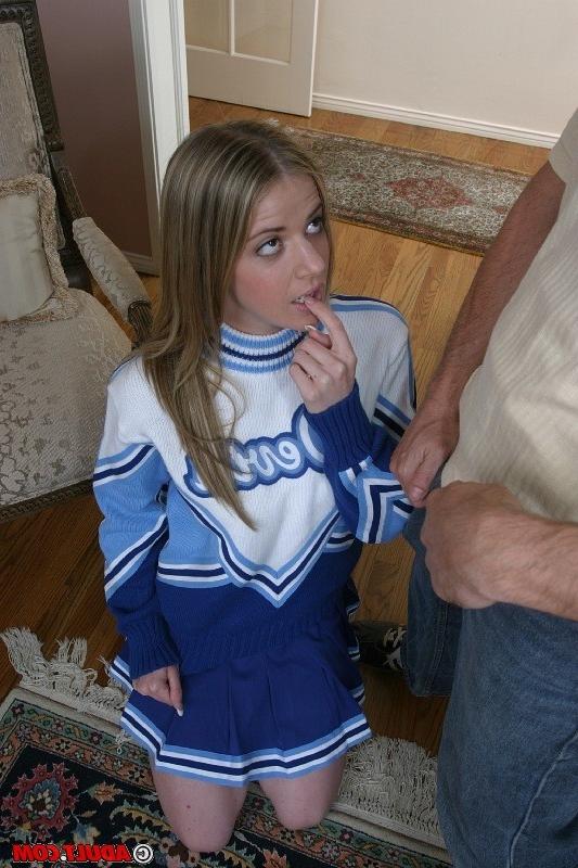 16P Uniformed schoolgirl cheerleader takes on two big cocks at once