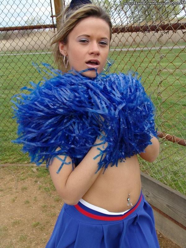 15P Busty Blonde Anna posing in a cheerleader outfit