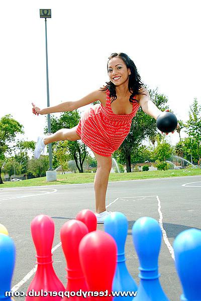 15P This curly brunette teeny bopper loves sucking random men's cocks