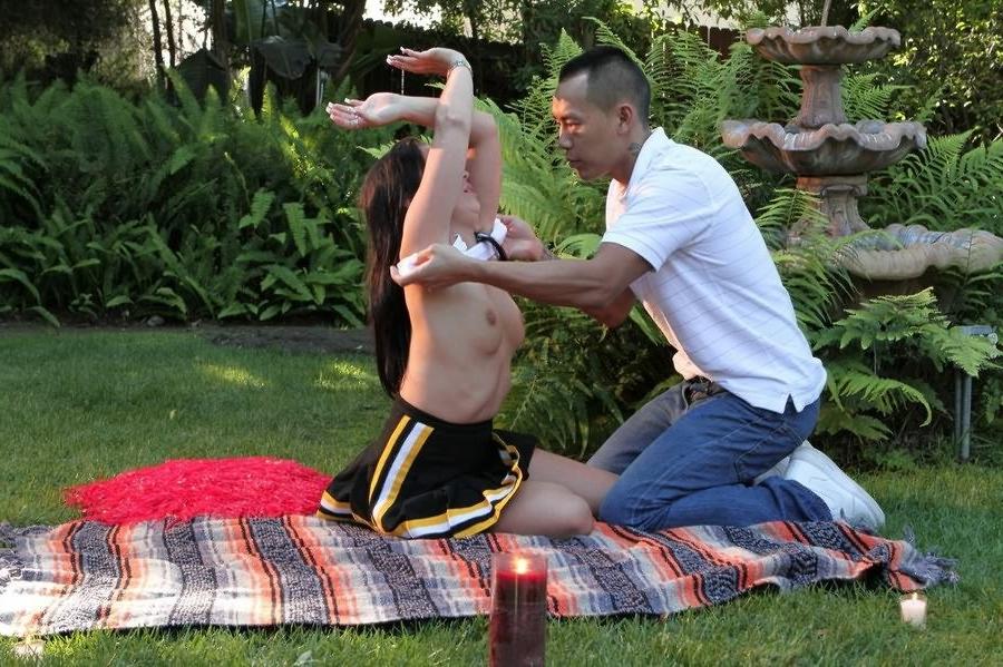 16P Brunette teen cheerleader Ally Style handling a massive dick outdoors