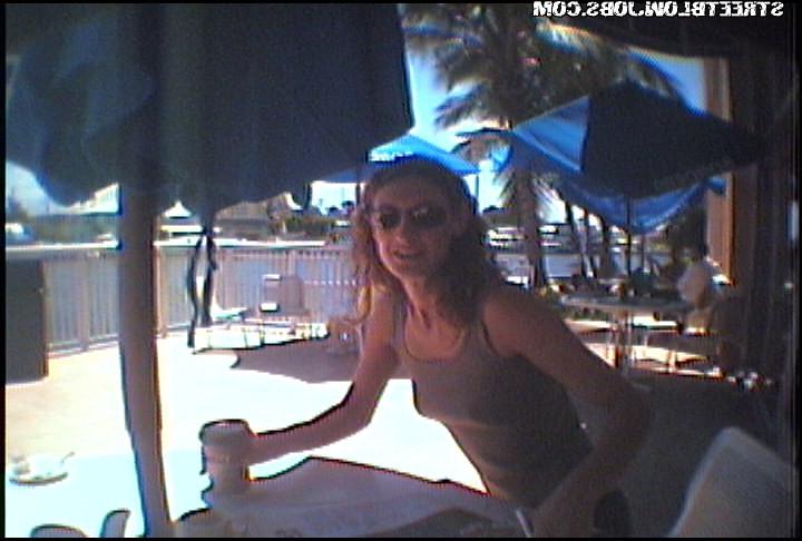 15P Curly brunette haired amateur getting naked and sucking cock