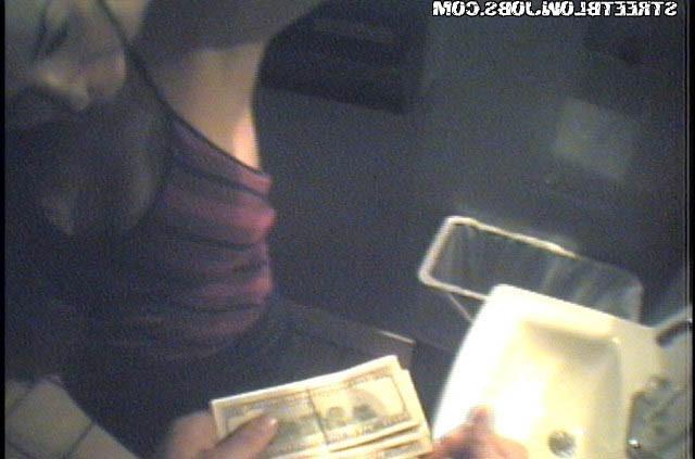 15P Latina chica showing off her full tits in bathroom