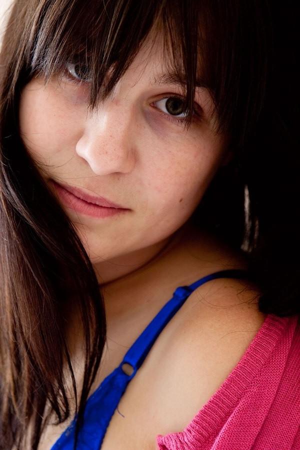16P Brunette playing with her unshaved pussy in the bathroom
