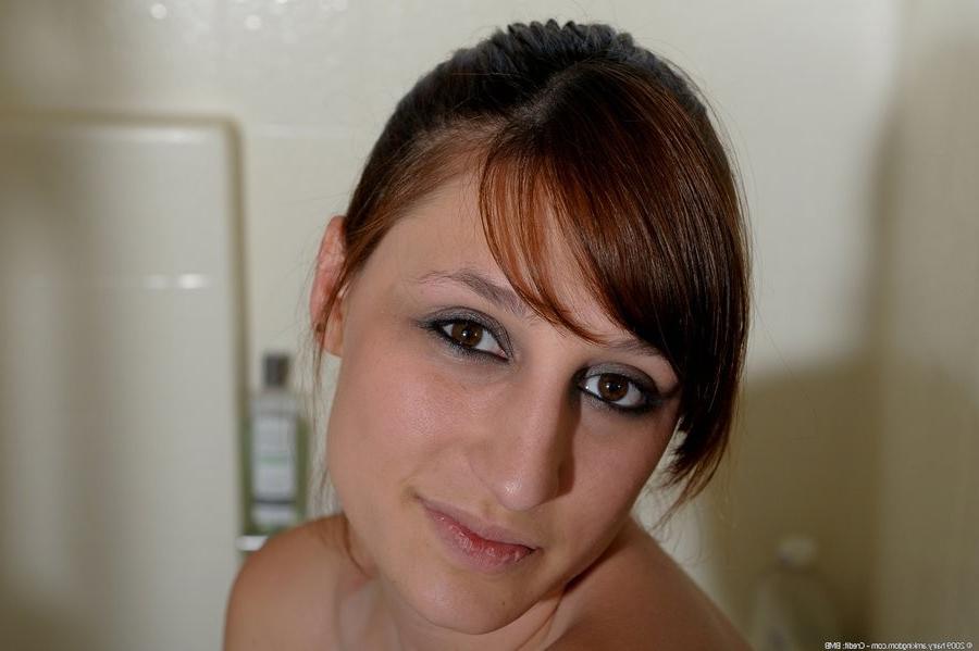 15P Hot And Hairy Brunette Strips And Spreads In The Bathroom