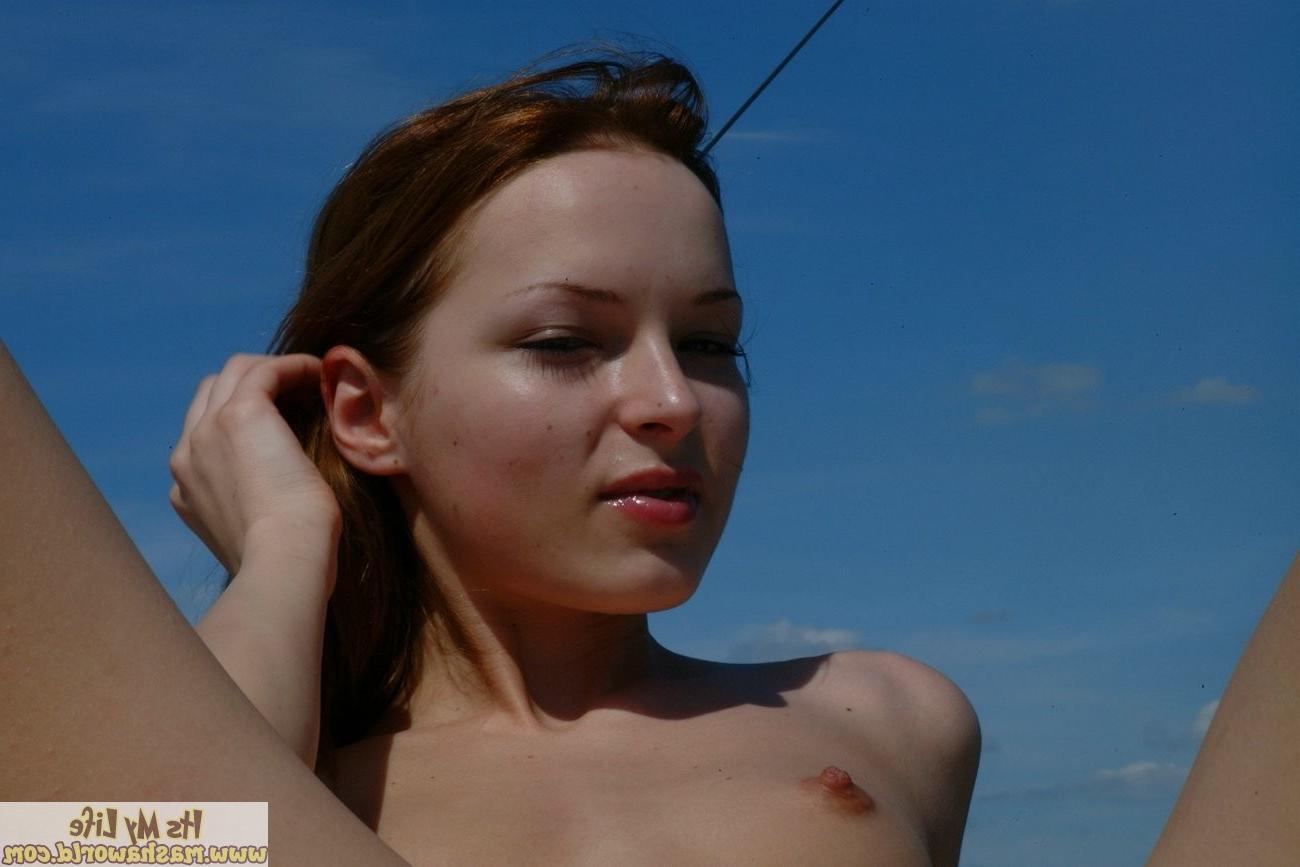 15P Delicious teen model taking a sun bath