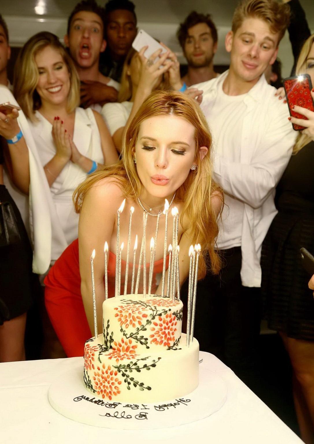16P Bella Thorne busty in tight red tube dress for her birthday