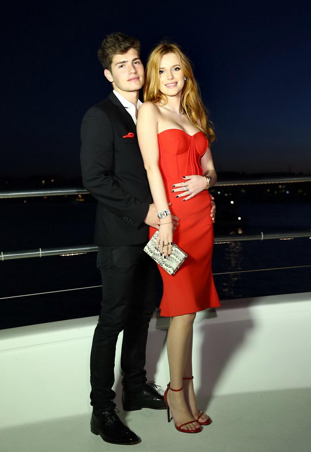 16P Bella Thorne busty in tight red tube dress for her birthday