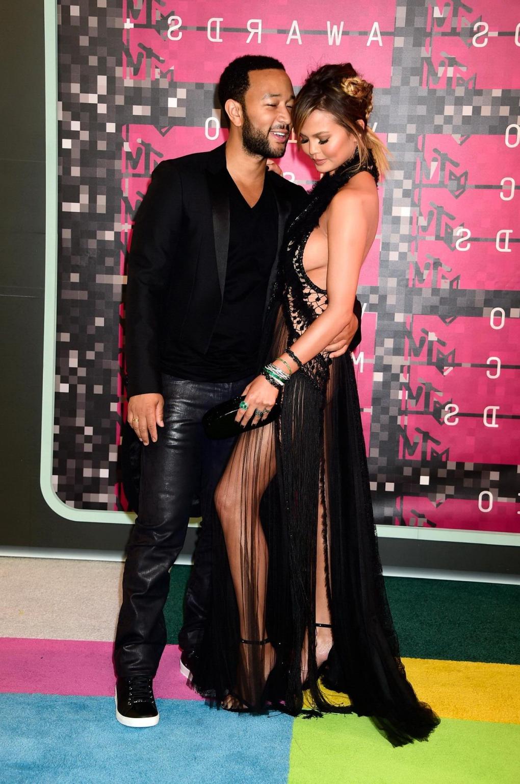 16P Chrissy Teigen flashing her pussy and sideboobs at the MTV Video