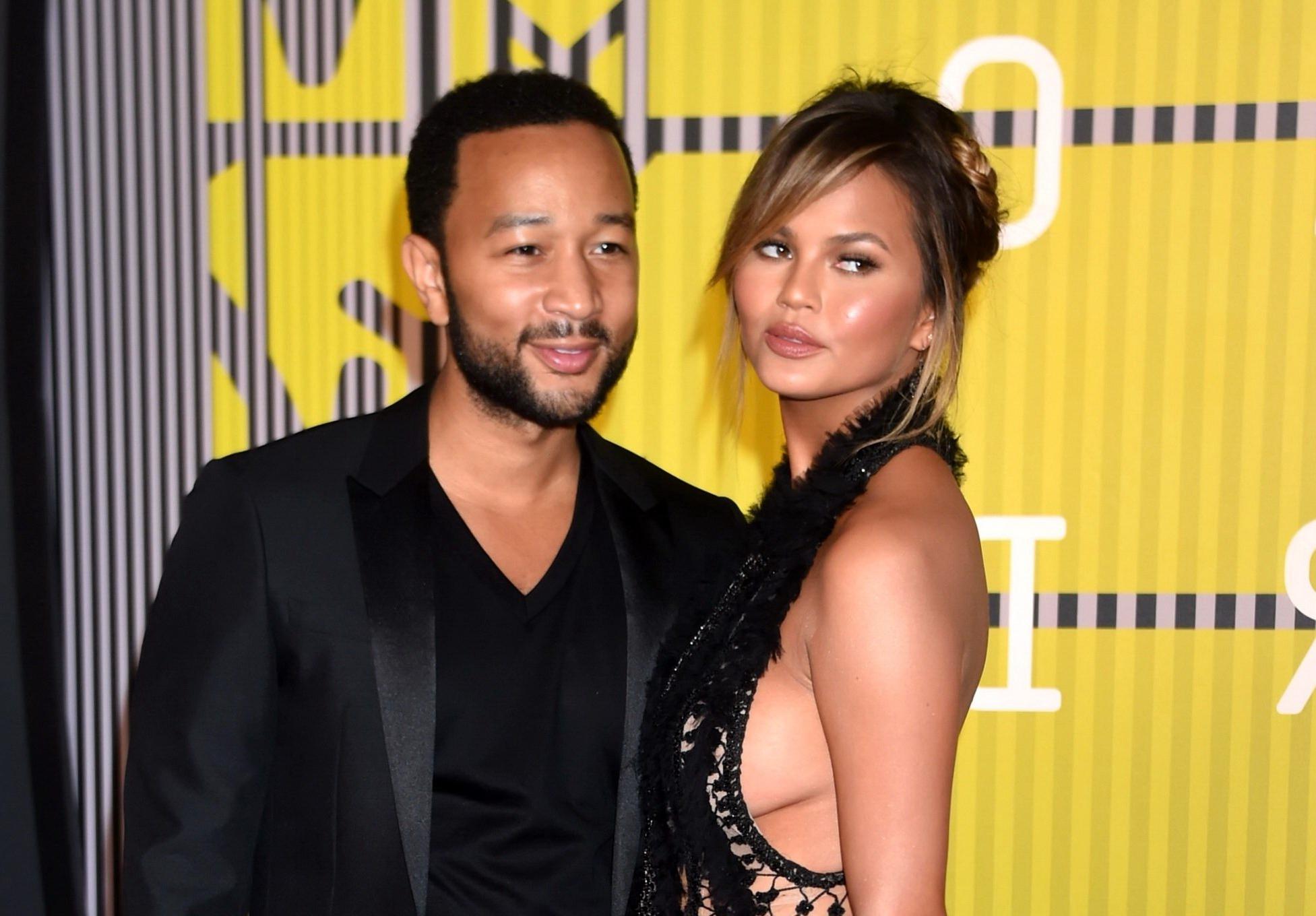 16P Chrissy Teigen flashing her pussy and sideboobs at the MTV Video