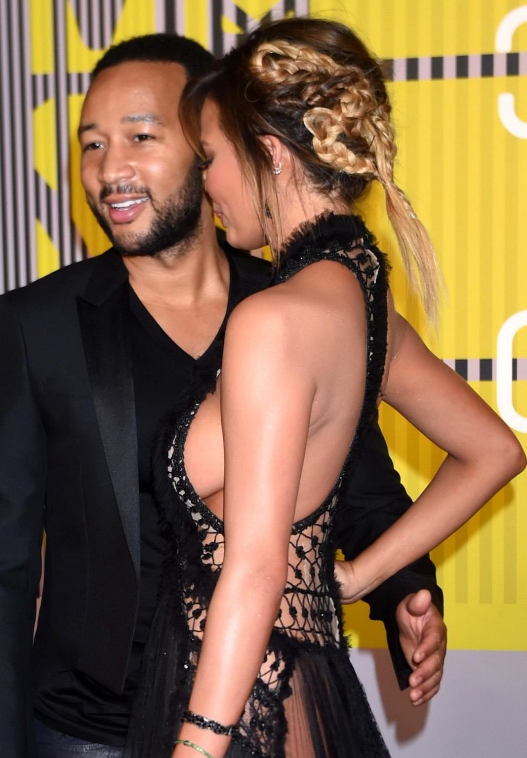 16P Chrissy Teigen flashing her pussy and sideboobs at the MTV Video