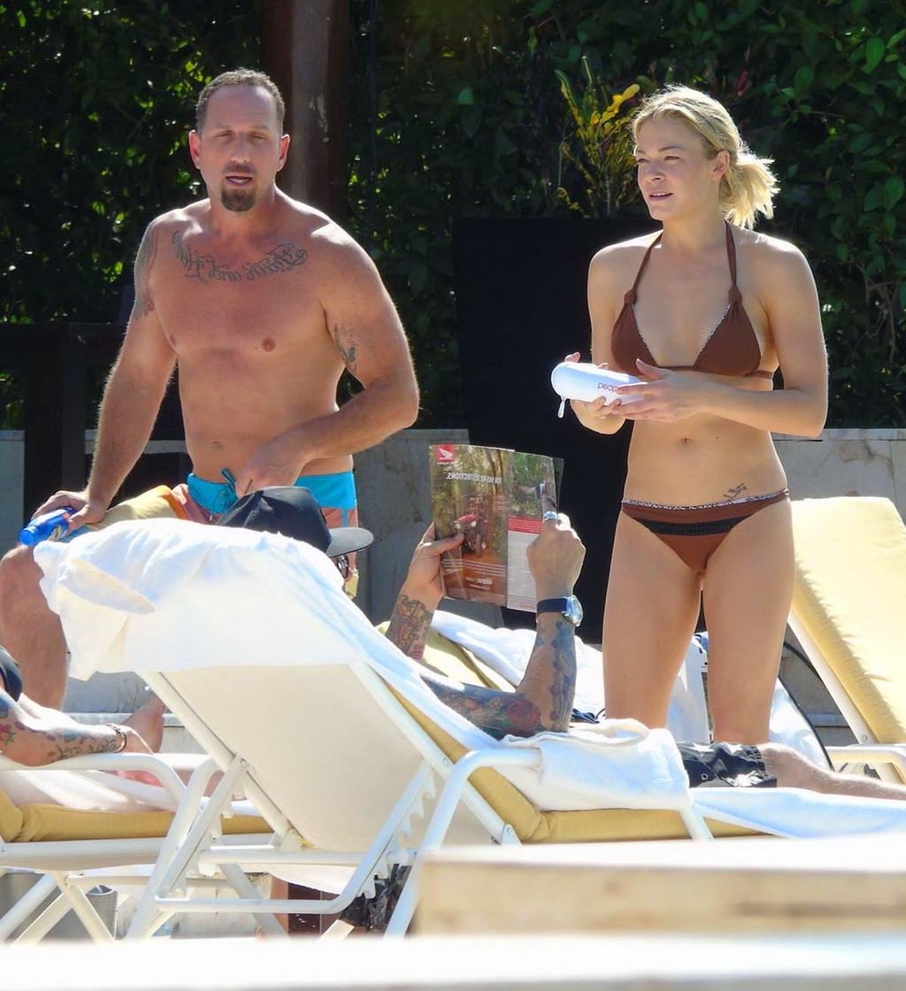 16P LeAnn Rimes showing ass in a brown thong bikini at the pool in Mexico