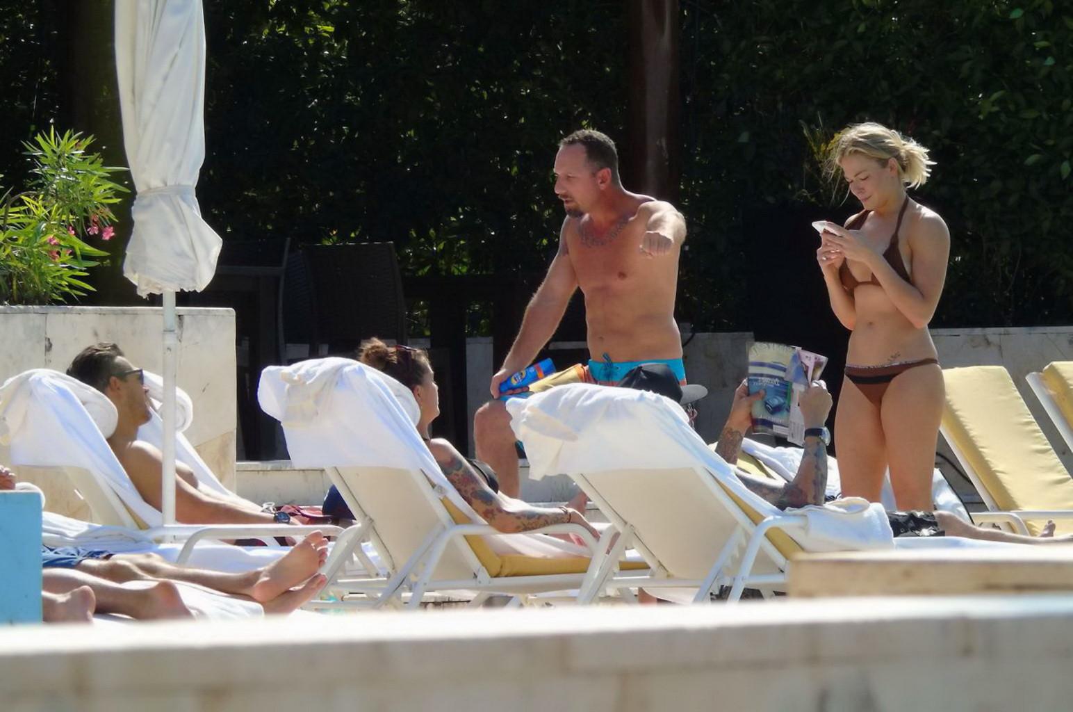 16P LeAnn Rimes showing ass in a brown thong bikini at the pool in Mexico
