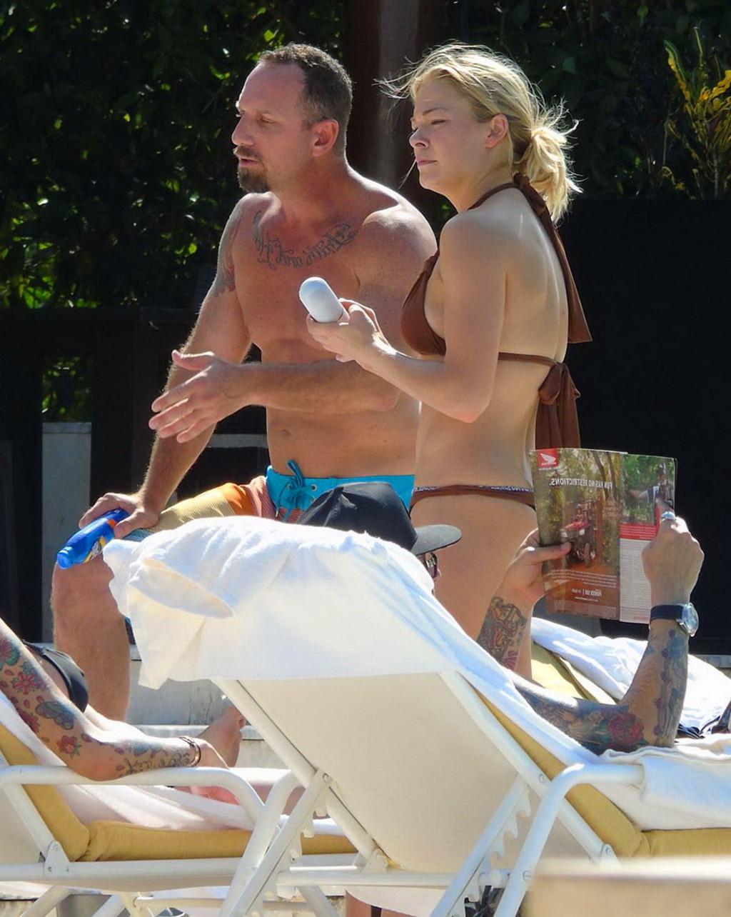 16P LeAnn Rimes showing ass in a brown thong bikini at the pool in Mexico