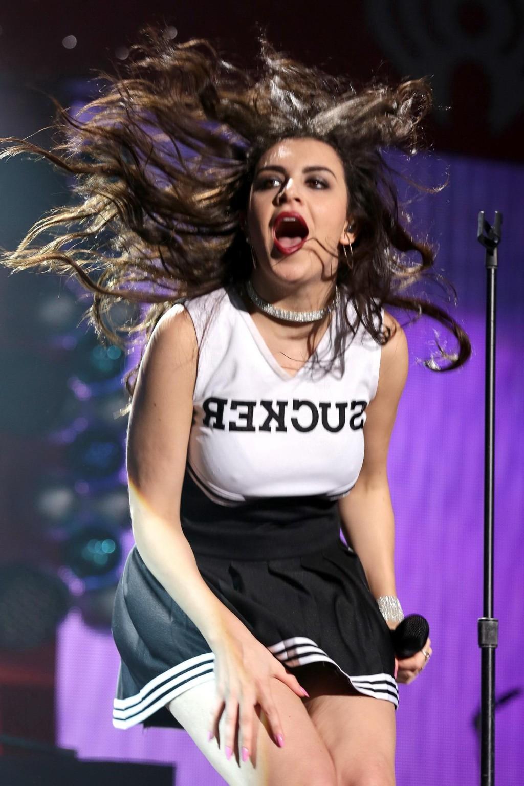 16P Charli XCX flashing her black thong on stage at the 933 FLZs Jingle Ball in Tamp