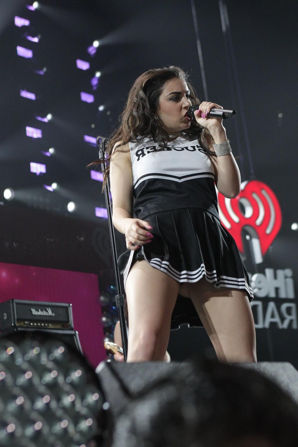 16P Charli XCX flashing her black thong on stage at the 933 FLZs Jingle Ball in Tamp