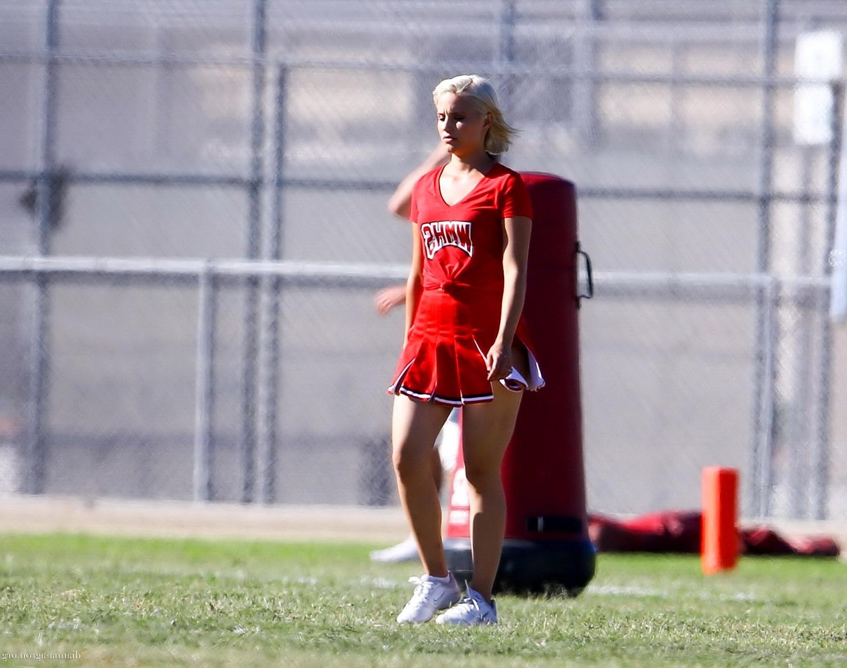 16P Dianna Agron in cheerleader outfit flashing her red panties on Glee season 6 set